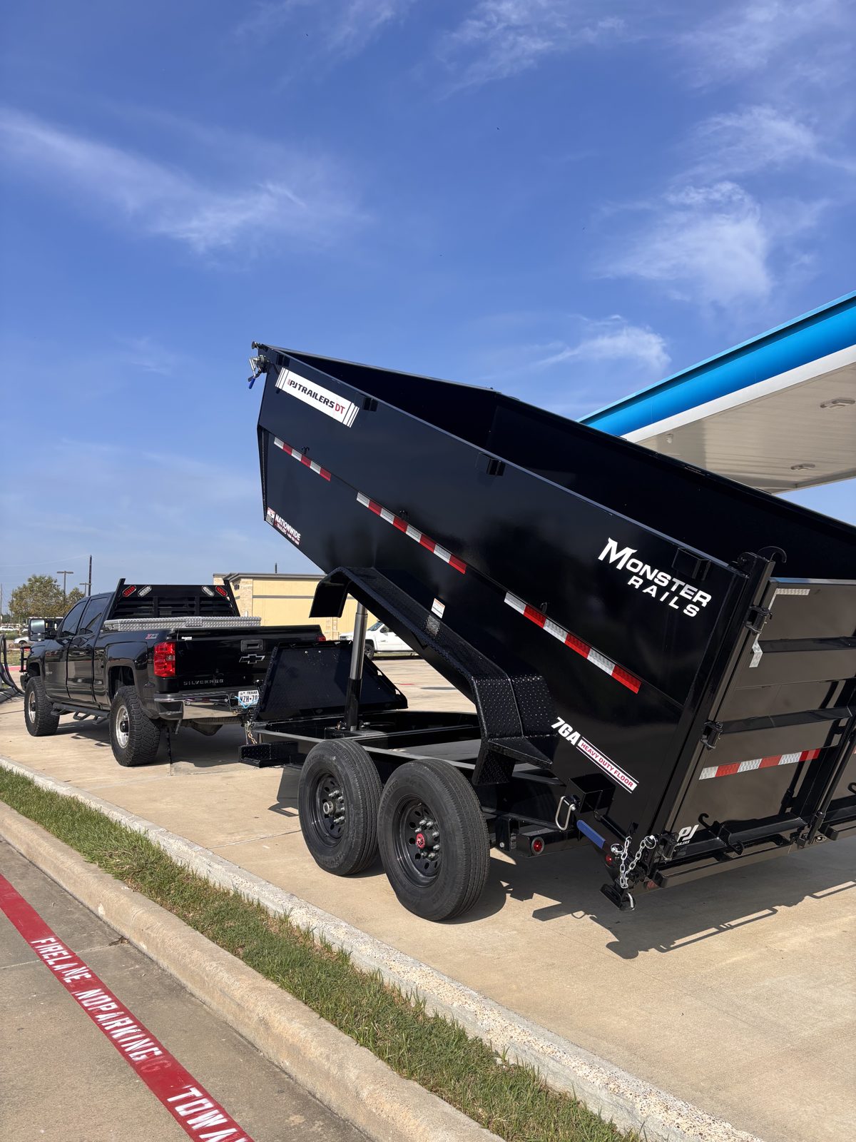 Dump trailer bed raised to unload