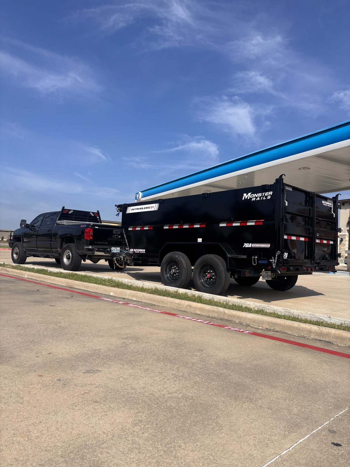 Dump trailer hitched and ready to roll